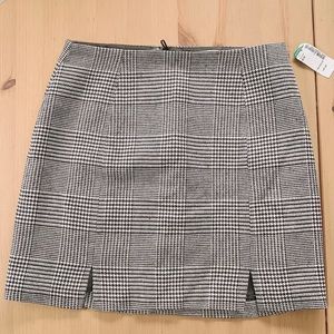 Twik mini skirt with tags on